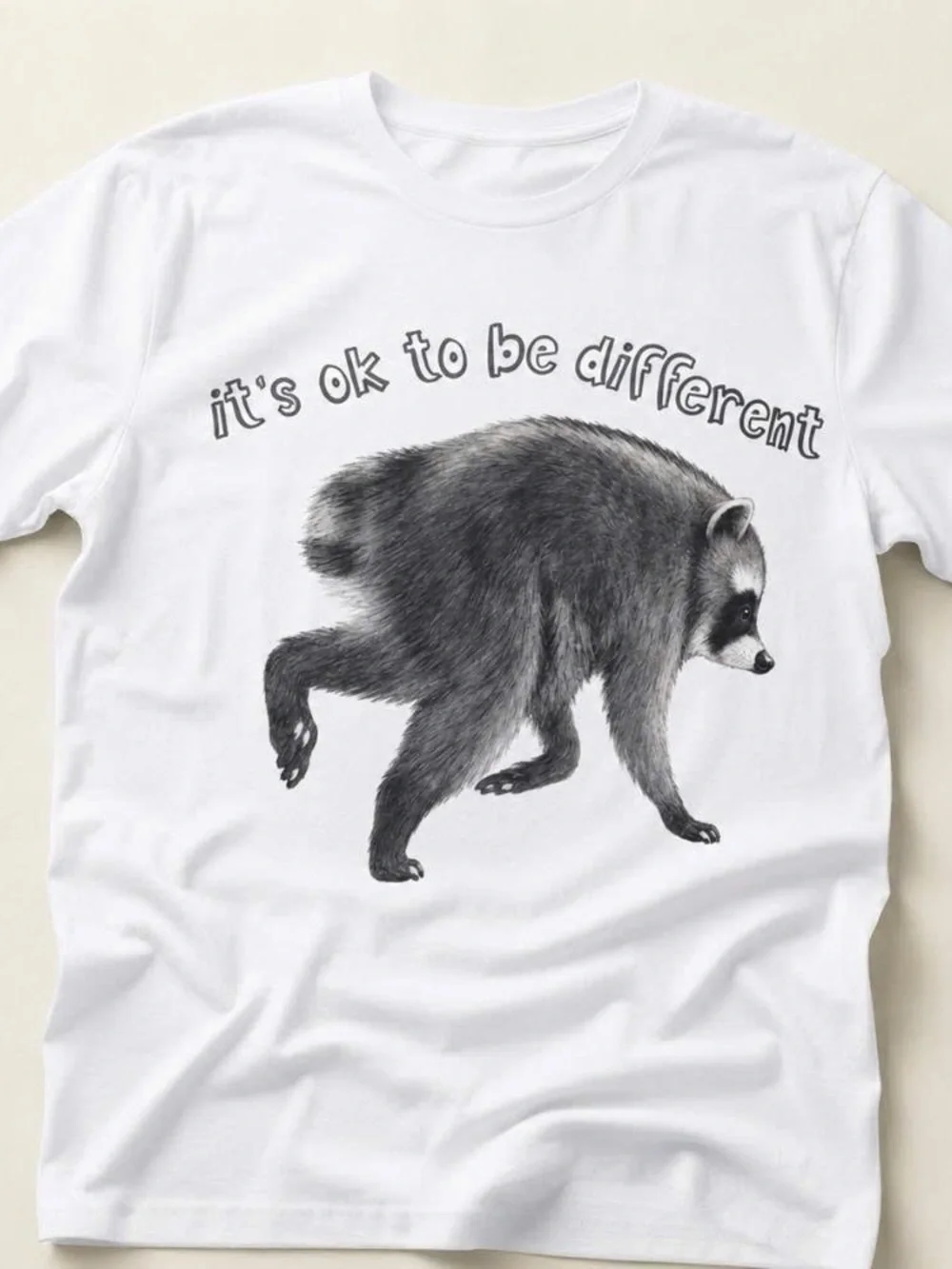It's OK To Be Different Jimothy Raccoon Graphic Tee Shirt - White